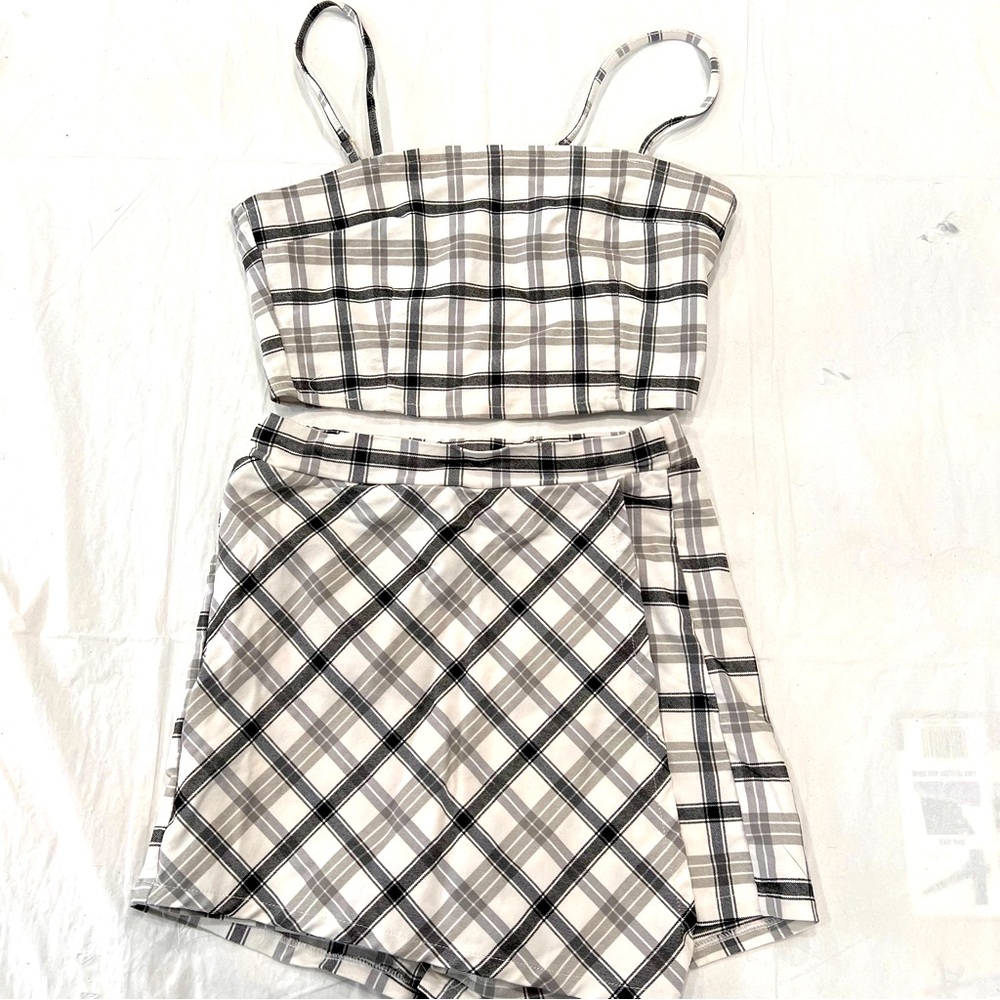 Adorable summer outfit by Rue 21. Matching adjustable top with skort.